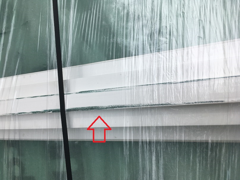 Green paint on interior of the Simonton window